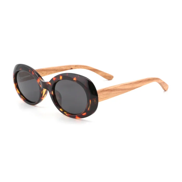 Stylish Oval Tortoiseshell Sunglasses With Wooden Temples - Image 1